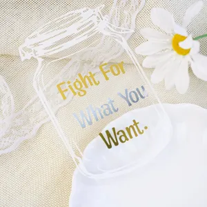 Detail view of mason jar shaped sticker with Fight For What You Want inspirational quote