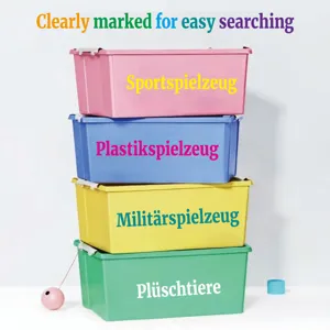 Detail view of German word stickers on colorful storage bins for easy sorting