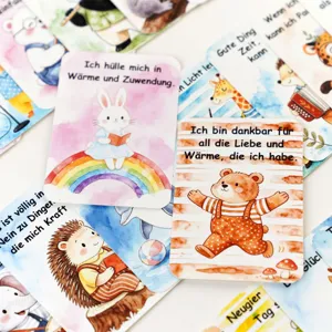 Detail of children's German SEL affirmation cards with cute animal illustrations