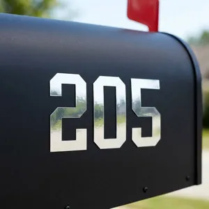 Silver reflective vinyl mailbox number stickers with industrial bold mechanical font