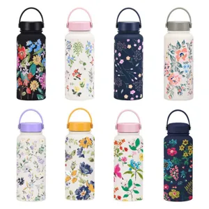 Macro view of various floral printed insulated stainless steel water bottles with handles