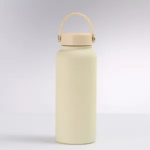 Close-up of minimalist matte cream insulated stainless steel water bottle with handle
