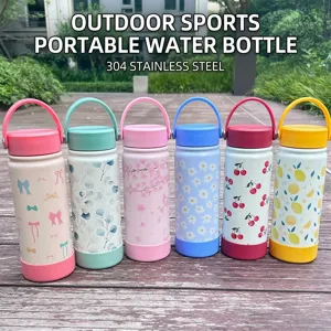 Close-up of colorful 304 stainless steel insulated bottles with floral and fruit patterns