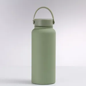 Sage green vacuum insulated 304 stainless steel water bottle with portable handle
