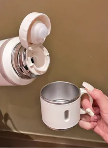 Detail of 316 stainless steel insulated vacuum flask showing the dual-purpose lid cup.