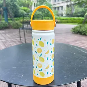 Close-up detail of a portable stainless steel insulated water bottle with lemon pattern