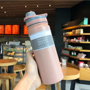 Handheld 530ml vacuum insulated stainless steel sports bottle in elegant pink finish