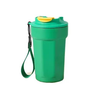 Green 316 stainless steel octagonal vacuum insulated coffee travel mug with carry strap.