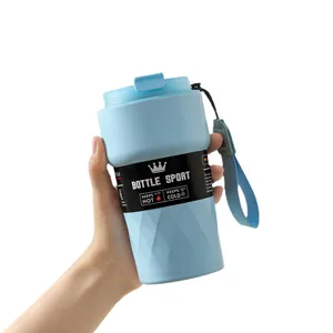 Light blue 304 stainless steel insulated travel mug with geometric texture