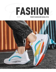 Detail of lightweight white sneakers with vibrant teal and orange side stripes on model.