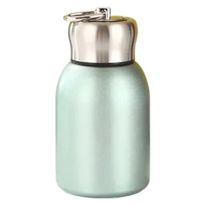 Mini stainless steel insulated water bottle with portable ring handle in mint green
