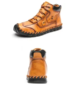 Detail view of stitching and texture on retro handmade leather men's mid-cut work boots