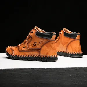 Handmade retro brown leather men's boots with high-top design, stitching, and soft sole