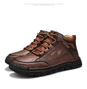 Detail view of retro brown leather men's work boots with durable stitching.