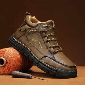 Vintage brown leather mid-top Martin boots for men with decorative hand-stitched detailing