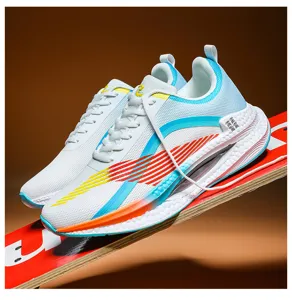 Close-up of lightweight white sneakers with vibrant blue and orange gradient accents