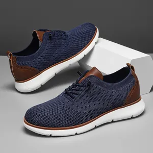 Men's breathable navy blue mesh sneakers with stylish brown leather accents and white soles
