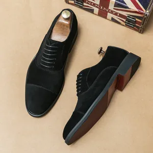 Elegant black suede men's Oxford shoes in British style with a classic pointed toe