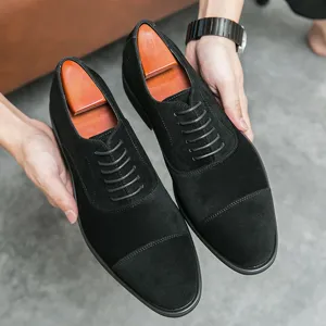 Elegant black suede men's pointed-toe oxford shoes in a classic British dress style
