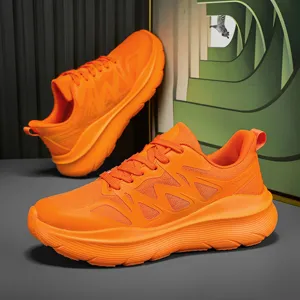 Scarpe da corsa outdoor arancioni vivaci per uomo e donna con tomaia in mesh traspirante