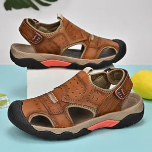 Close-up of brown genuine leather men's outdoor sandals with a protective closed-toe design
