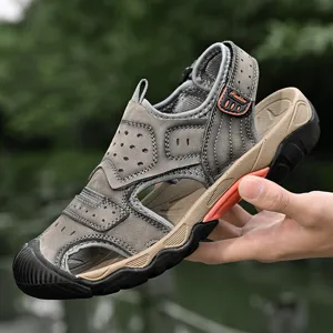 Detailed close-up of grey leather men's outdoor leisure sandals with durable stitching