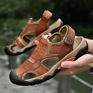Detail view of brown genuine leather men's outdoor sandals with protective toe cap