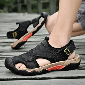 Detailed side view of men's black leather outdoor sandals with breathable design.