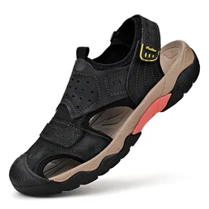 Detail view of a men's black leather outdoor sandal with breathable perforations.