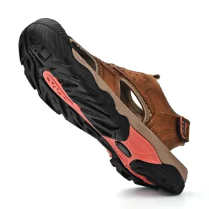 Detail view of men's brown leather sandals showing durable anti-slip rubber sole