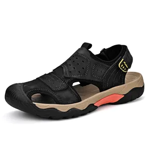Side view of men's breathable black leather outdoor casual sandals with orange sole detail