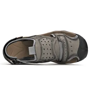 Macro top-down view of men's genuine leather outdoor leisure beach sandals in grey