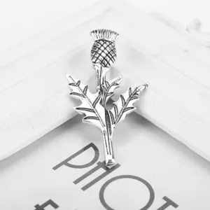 Detailed view of the vintage silver Scottish thistle brooch inspired by Outlander.