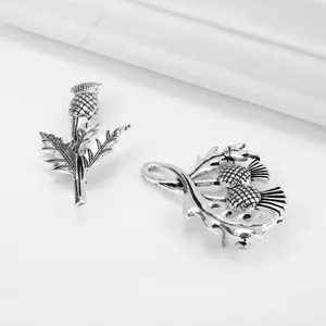 Detailed view of Outlander inspired antique silver Scottish thistle floral brooches