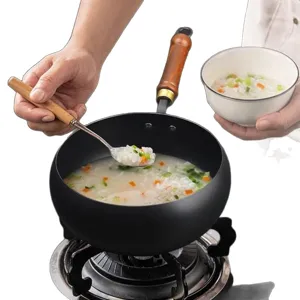 Handgemaakte Zhangqiu ijzeren buikpot met houten handvat voor antiaanbaklaag koken