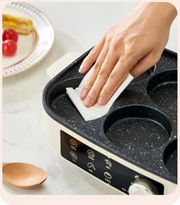 Close-up showing the easy-to-clean non-stick surface of this electric breakfast pan