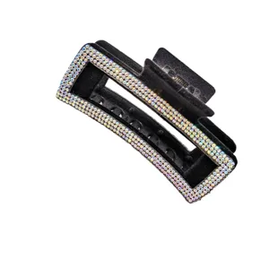 Grande pince à cheveux en velours noir et strass pour femme, accessoire d'hiver élégant.