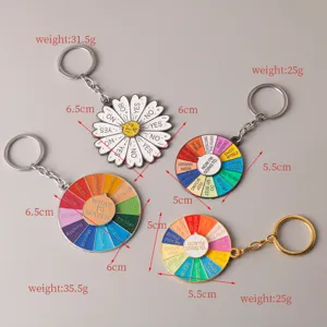 Fun rainbow decision wheel and daisy metal keychain set, creative rotatable keyring gifts.