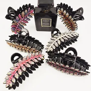 Set klampsion mallion me strass kai fyllo maura plastika klamparia gia pachia mallia.