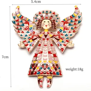 Detailed view of the colorful enamel angel girl brooch, alloy badge with wings and mosaic design.