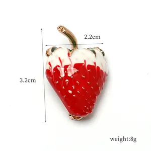 Elegant red white enamel strawberry brooch pin with gold stem for stylish women apparel decor