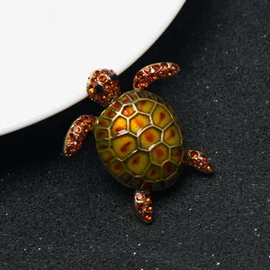 Cute turtle brooch with rhinestones and enamel, perfect for clothes, bags, and backpack decoration.