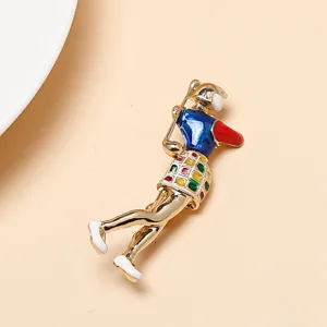 Exquisite enamel sport girl brooch pin, stylish gold-plated fashion jewelry accessory.