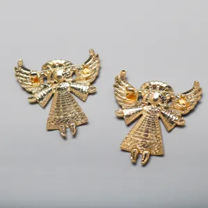Detail view of gold angel girl wing brooch back alloy pin fashion jewelry accessory