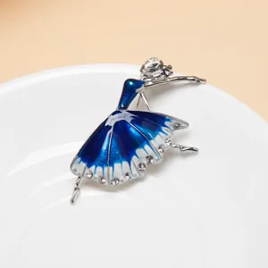 Elegant blue enameled ballerina dancer brooch close-up, sparkling crystal rhinestone details for women.