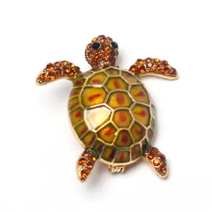 Cute sea turtle brooch pin with sparkling rhinestones and enamel shell for bag decor.