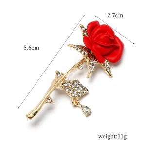 Close-up details of the elegant red rose rhinestone brooch showcasing exquisite craftsmanship.