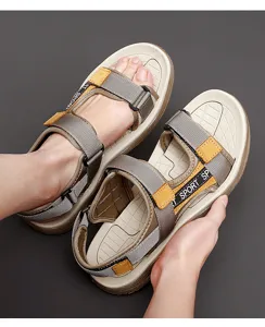 Detail view of men casual outdoor sport sandals with breathable webbing straps and thick rubber sole.
