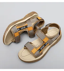 Detail shot of mens outdoor casual sandals with velcro straps and anti-slip sole design.