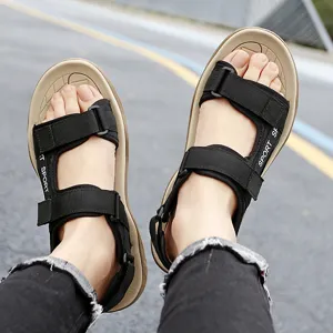 Men outdoor casual sports sandals detail view showing black straps and tan comfortable sole.